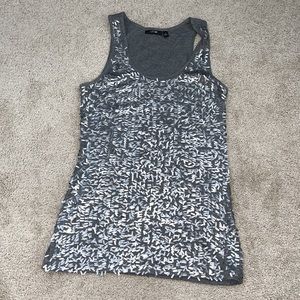 Cute tank top. Apt 9 size small. Soft with shiny Gray front